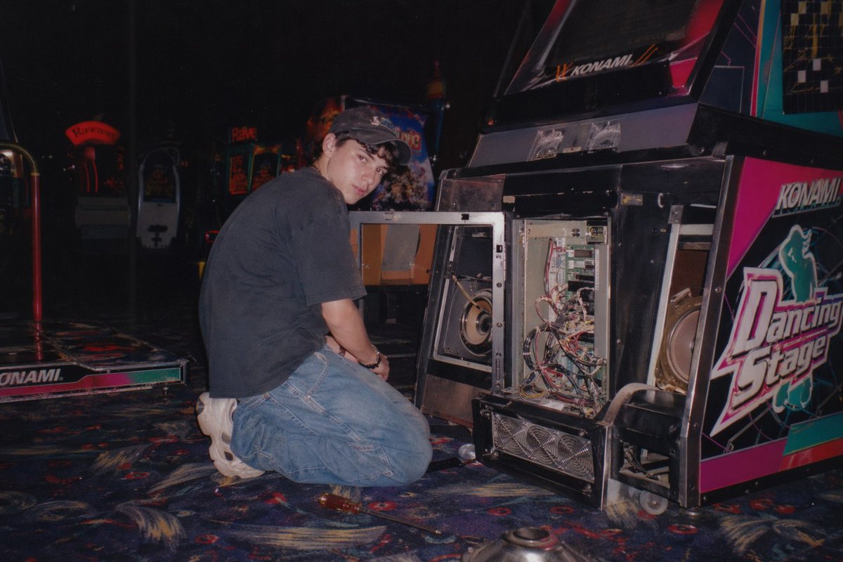 AI image generated from the “A vintage, late 90s amateur flash photograph of a young man” prompt